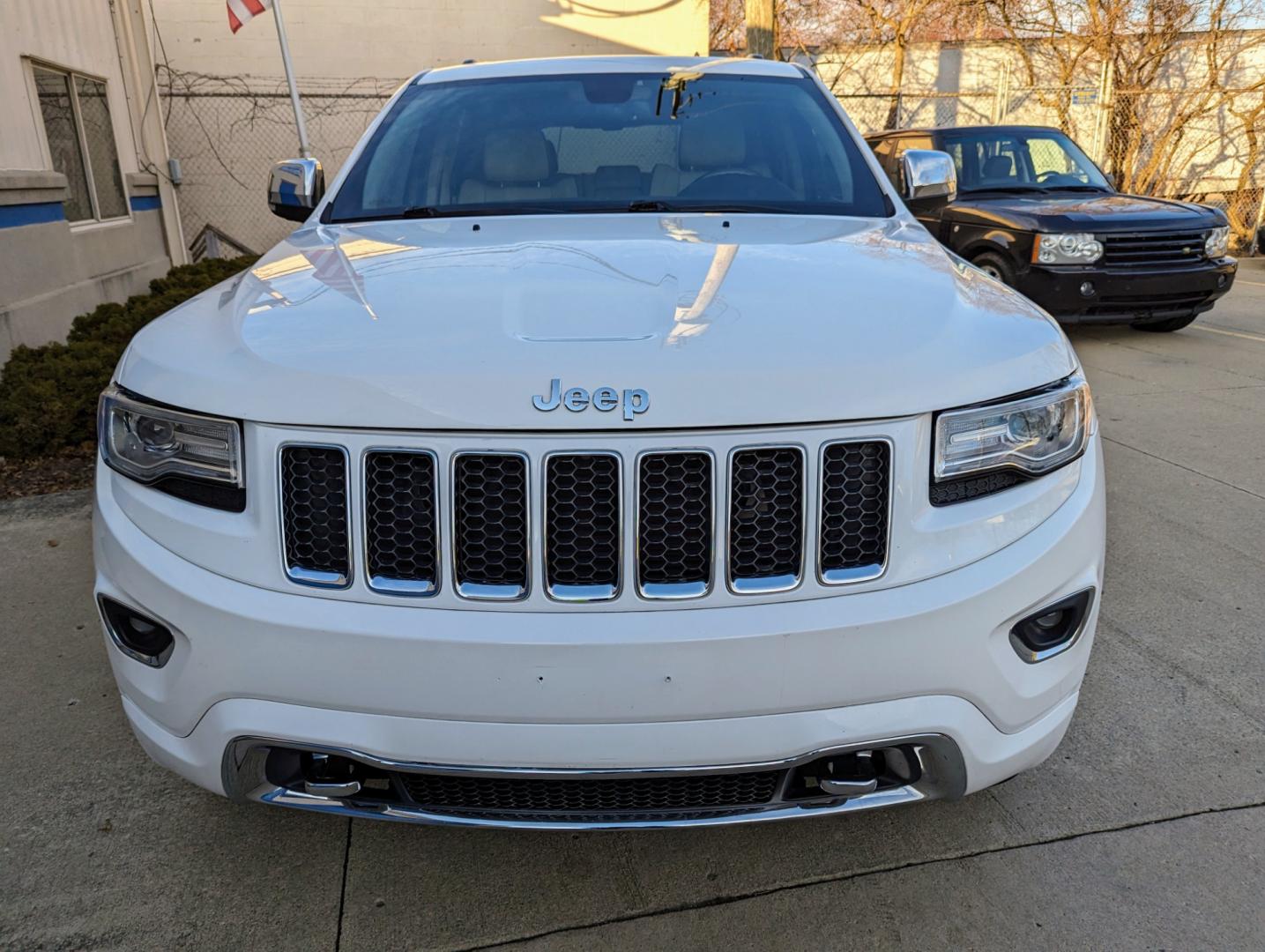 2014 White /Nepal Tan Jeep Grand Cherokee (1C4RJFCGXEC) with an 3.6L V6 DOHC 24V engine, Automatic transmission, located at 603 Amelia Street, Plymouth, MI, 48170, (734) 459-5520, 42.378841, -83.464546 - Vehicles shown by appointment - Please call ahead - 734-459-5520, text 734-658-4573 or contact us via our web site at: http://www.selectmotors.com for complete Inventory, Photos, Videos and FREE Carfax Reports. 2014 Jeep Grand Cherokee Overland, Bright White/Nepal Tan interior, 116K miles, all wh - Photo#3